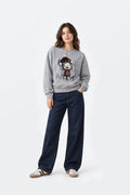 Sudadera muñeca pompom